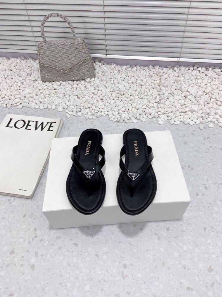 Sandals and slippers Prada