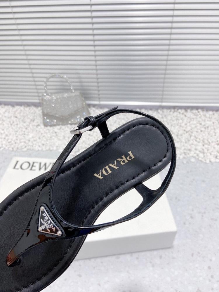 Sandals and slippers Prada