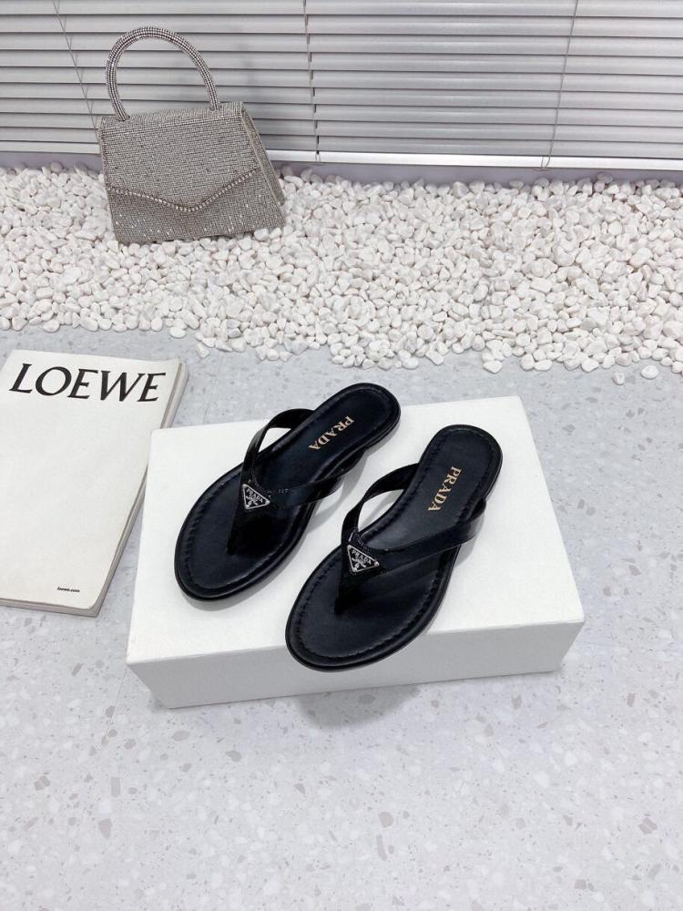 Sandals and slippers Prada