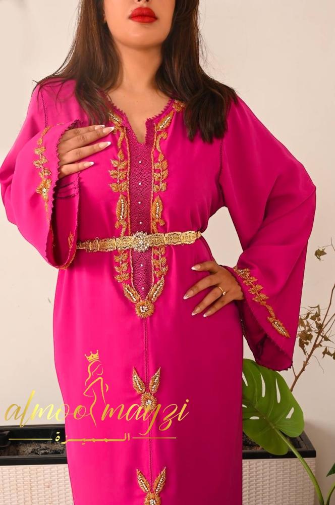 The distinctive caftan with the randa, embroidery, and hand embroidery