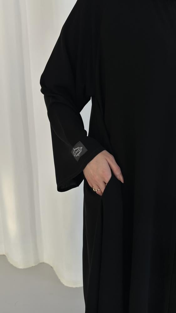 عباية كلوش اسود بقماش ملكي بجيوب مخفية وطقطق