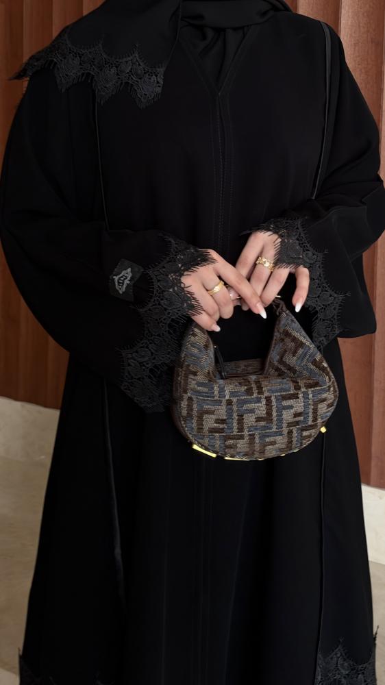 عباية نص كلوش قماش (سراميك) اضافة كلفة اسود