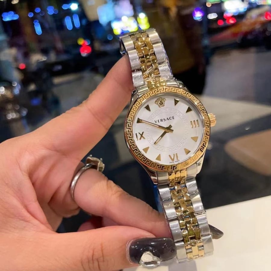 ساعة فرزاتشي ذهبي بفضي ابيض