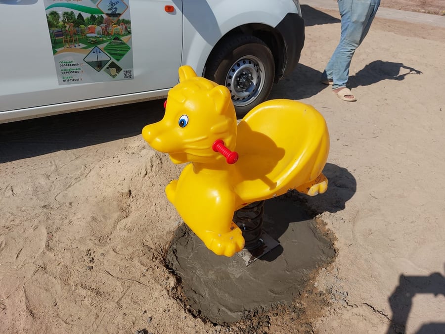 لعبة هزاز على شكل قطة
