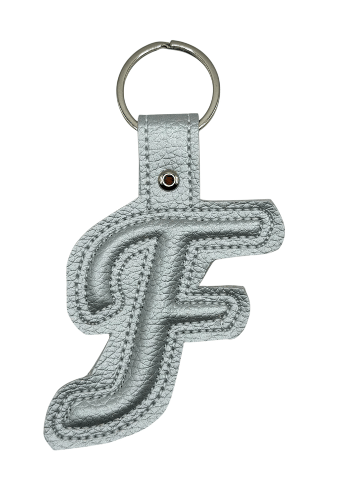 Three-dimensional embroidered medal with the letter (F)