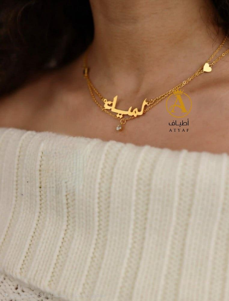سلسال بتصميم سلسالين رقبة مع لمسة القلوب و الزركون يجمل عُنقها
