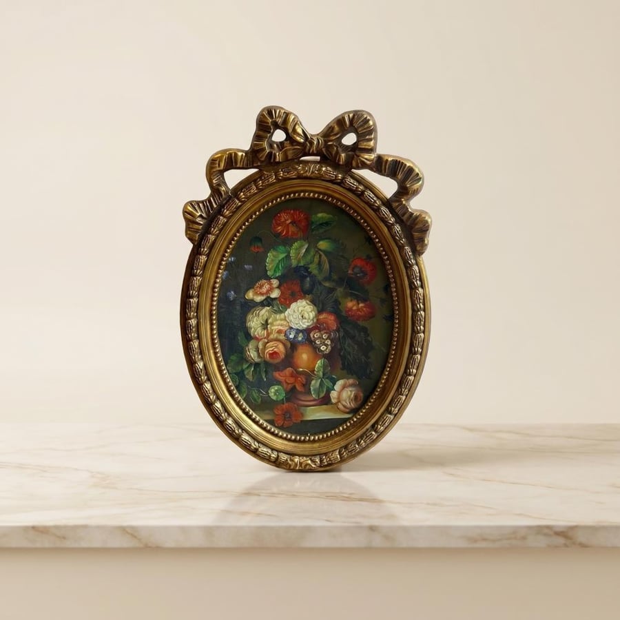 Classic flower painting with a gold ornate oval wooden frame – elegant Roman style