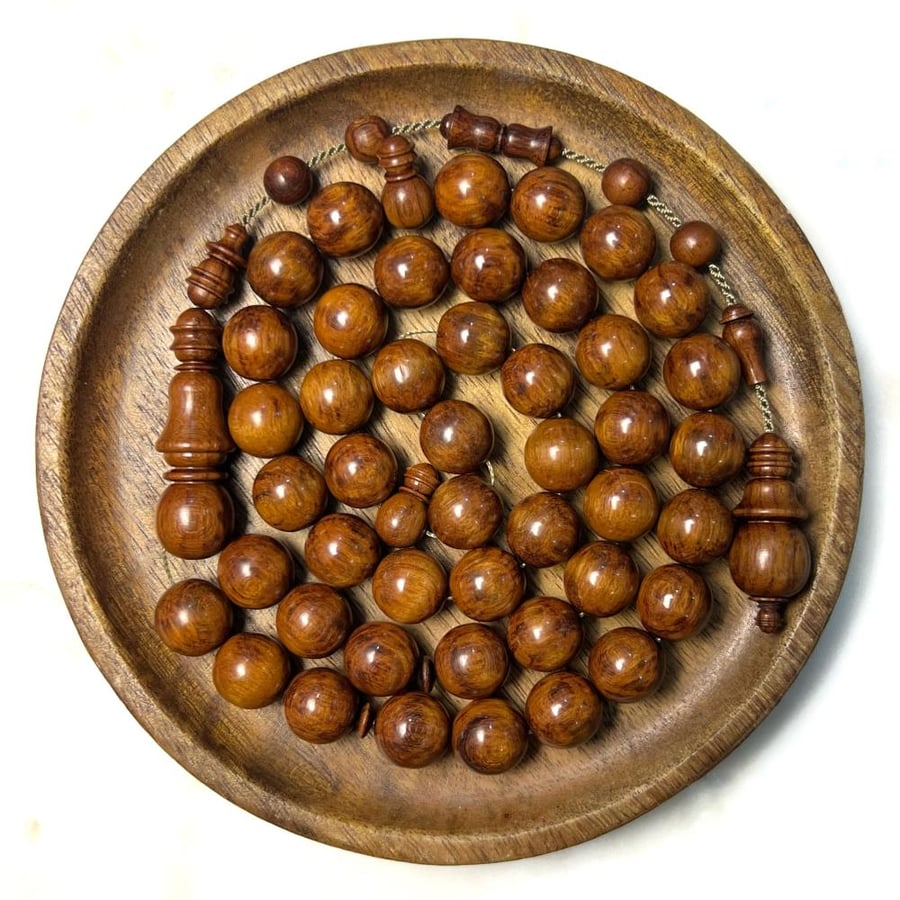 مسباح خشب الحية