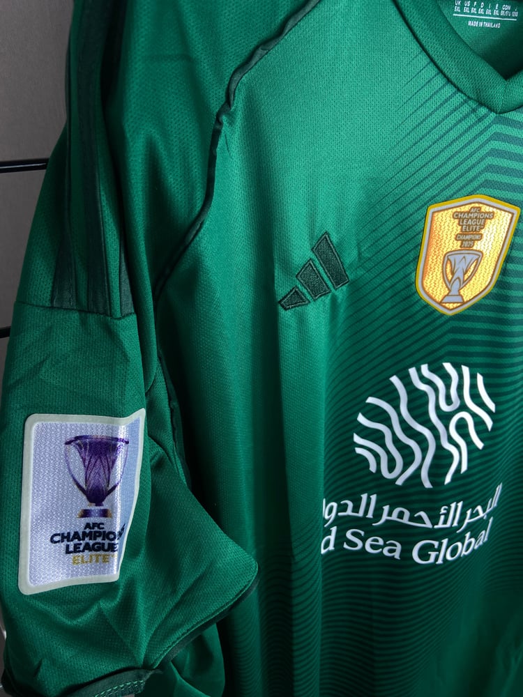 تيشرت الاهلي بشعارات النخبة(2025-26) الاساسي جامبو