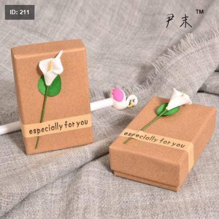 Red packaging with artificial flower gifts