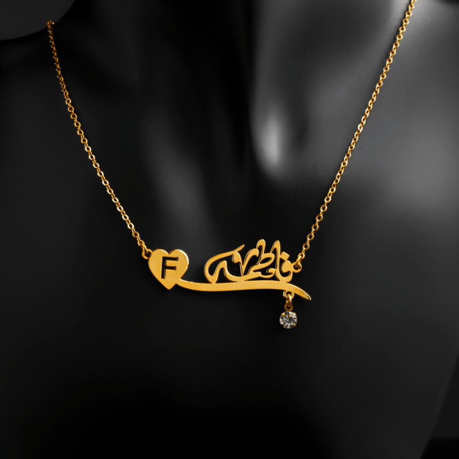 A pendant with a gold-plated design with a distinctive shape