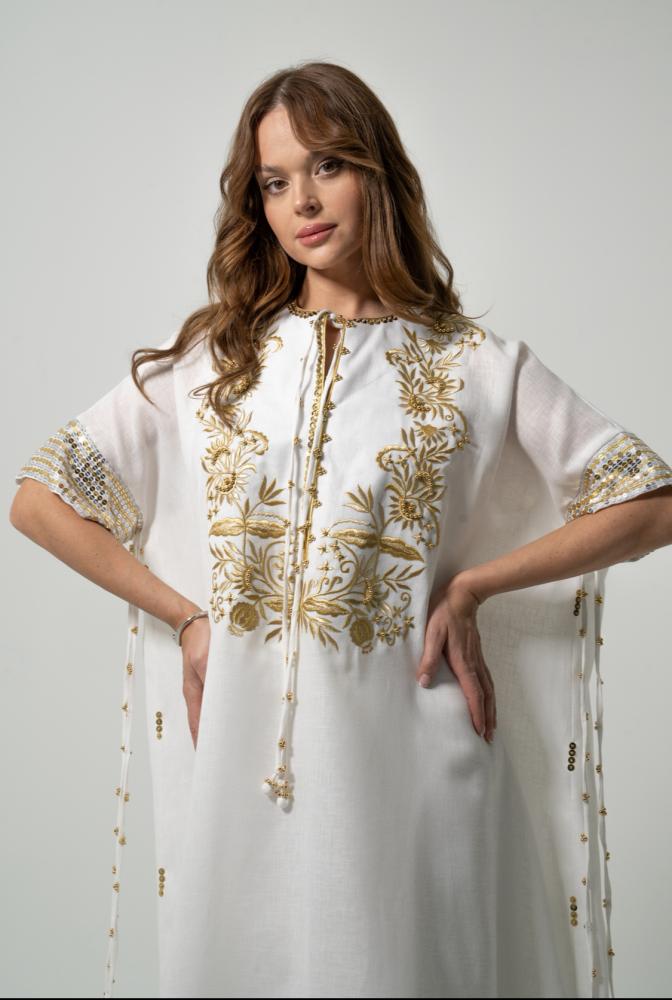 White dress with gold cane embroidery