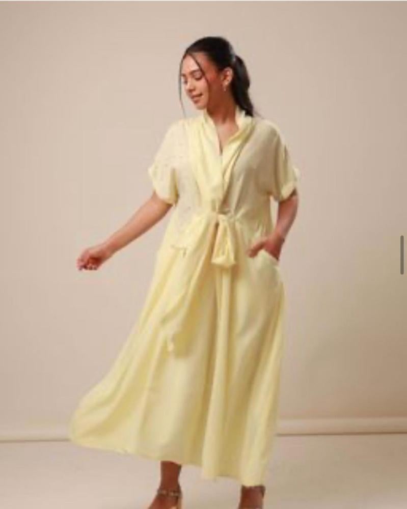 Light yellow dress with a fixed waist tie, decorated with Swarovski crystals on the chest