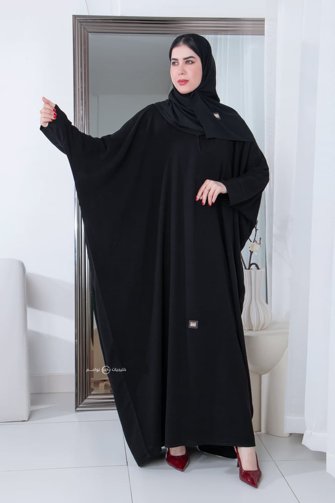 عبايه على الكتف