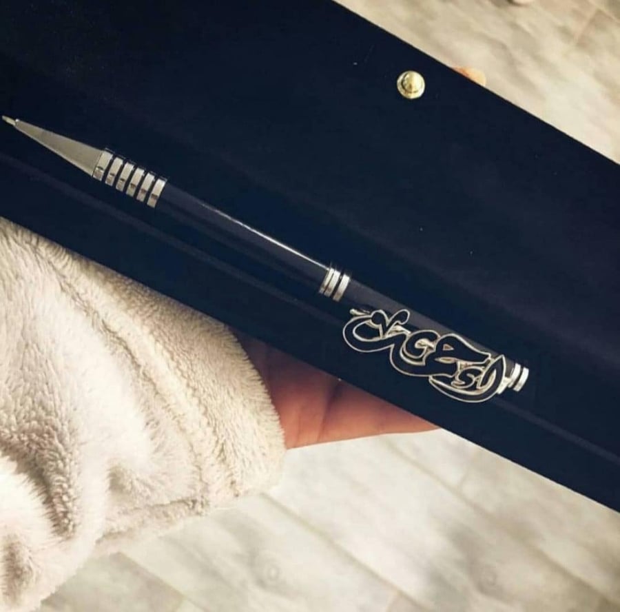 A pen with the name padded - fall