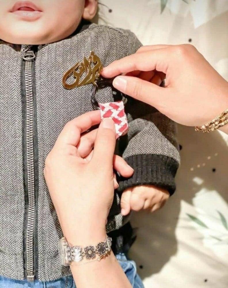بروش أطفال بالاسم مع شماغ