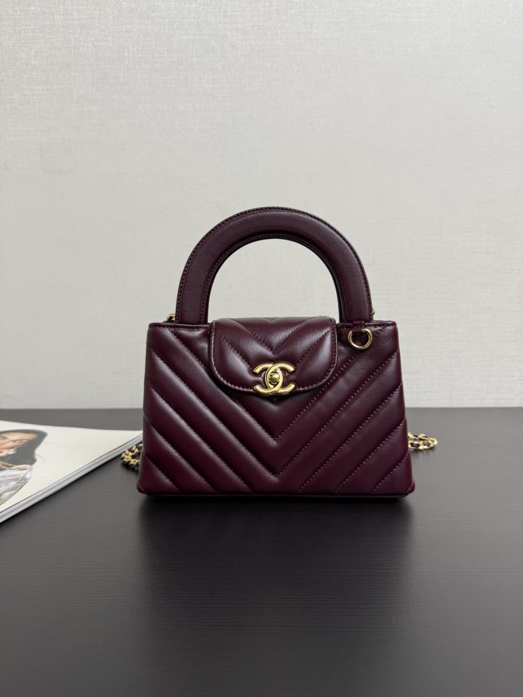 Chanel Mini Kelly Top Handle Chevron Quilted Leather Bag