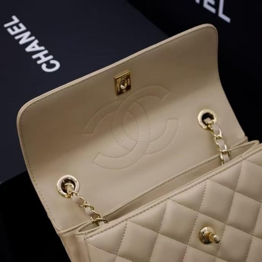 Chanel Quilted Top Handle Flap Bag with Metal Plate