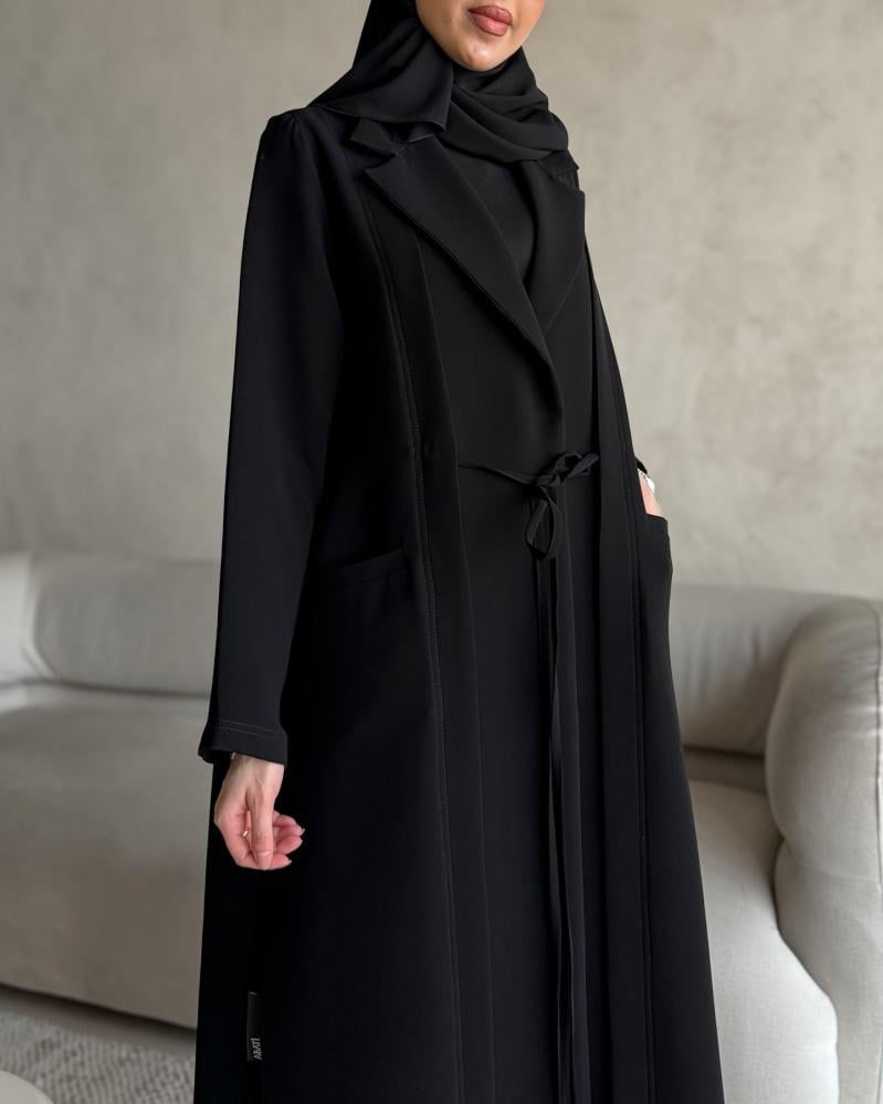 عباية  ‬‏عبايه عمليه و مميزه بجيوب