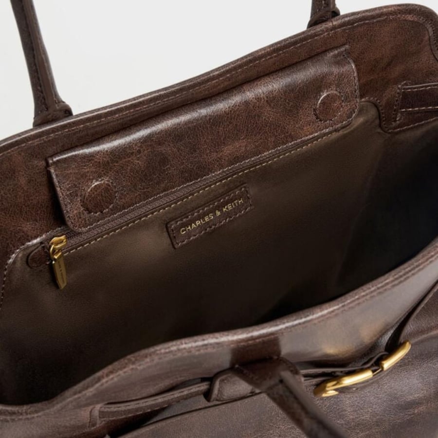 Victoria belted trapeze bag