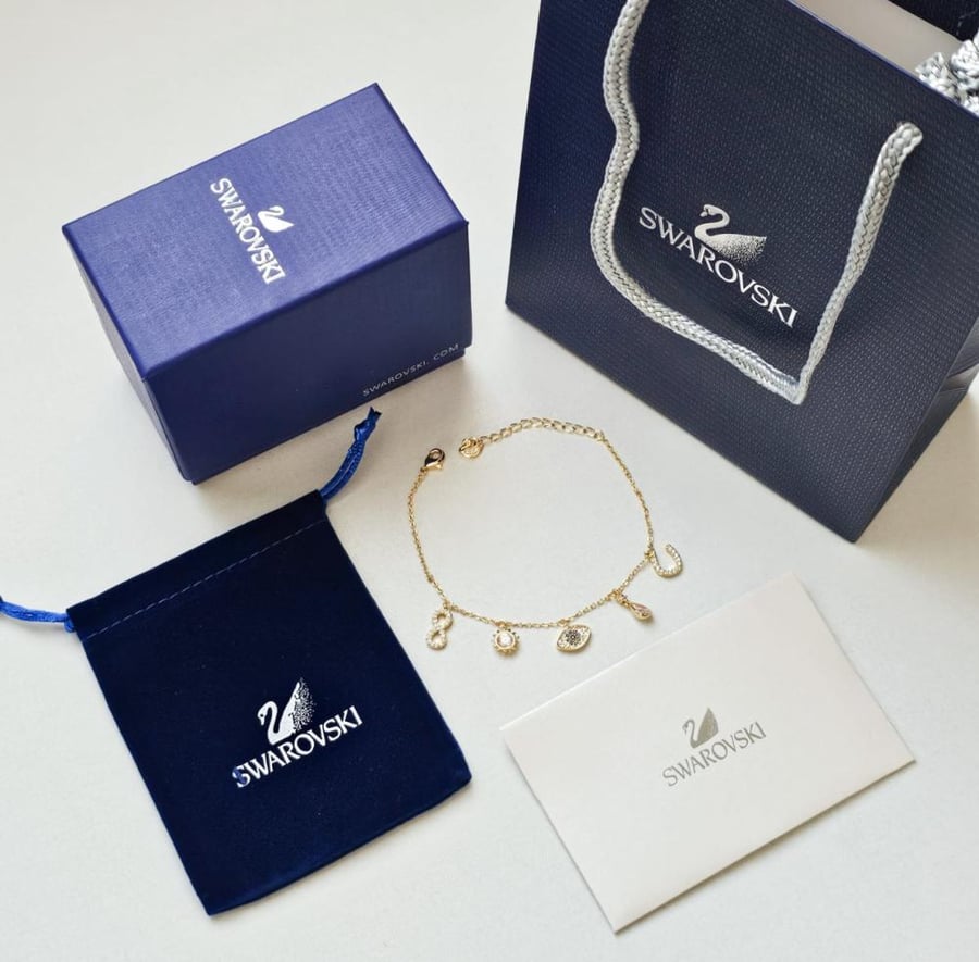 أسورة ذهبي ماركة سواروفسكي مع الملحقات