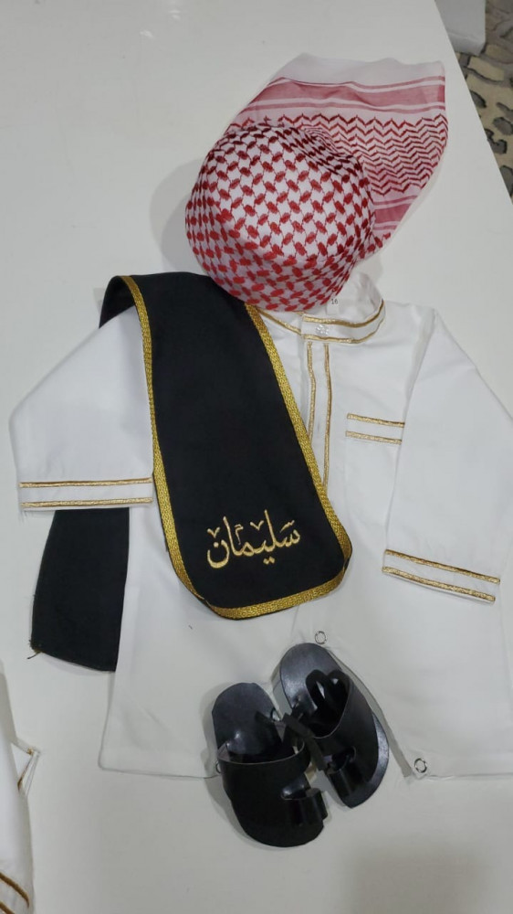 بربتوز مع وشاح وشماغ وشوز