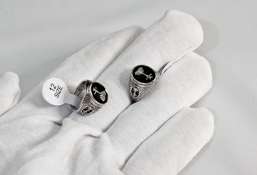 Black sword and palm tree ring