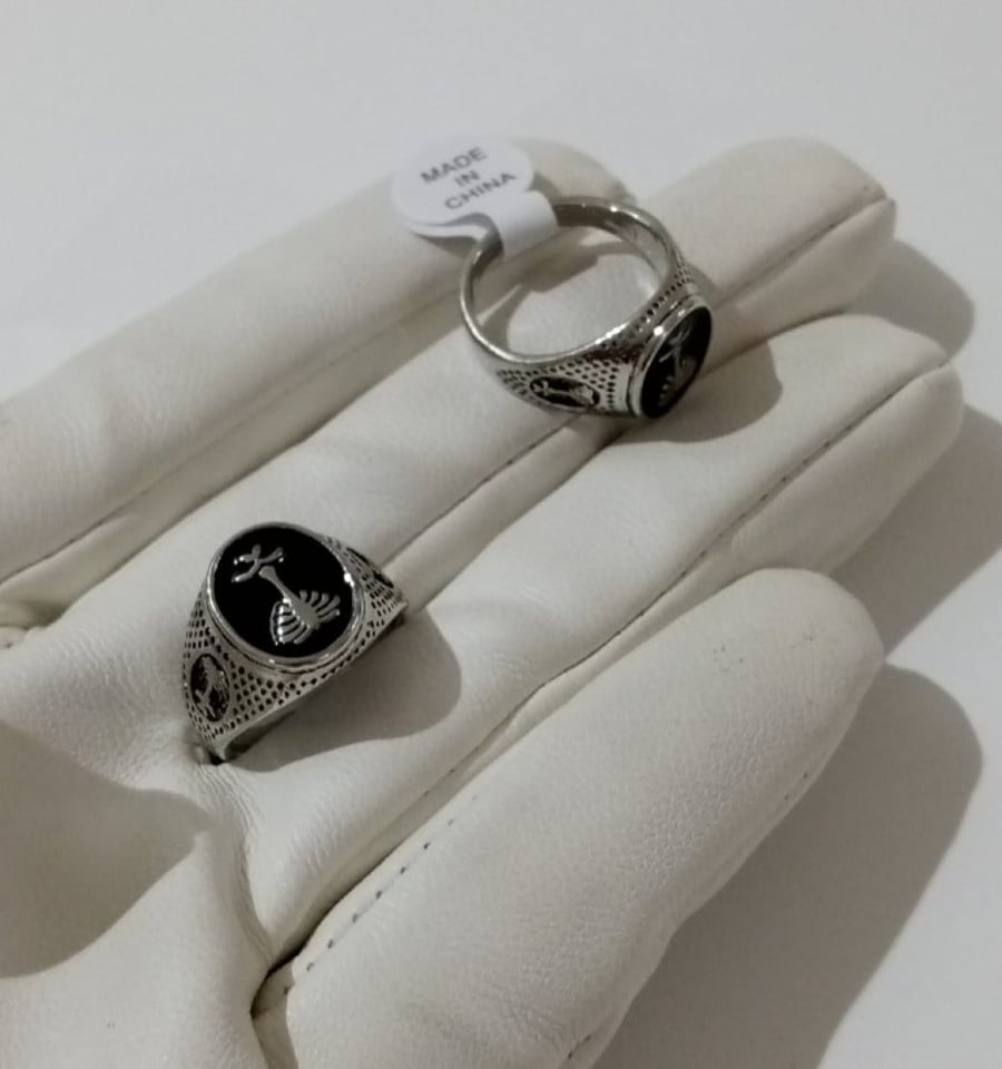 Black sword and palm tree ring
