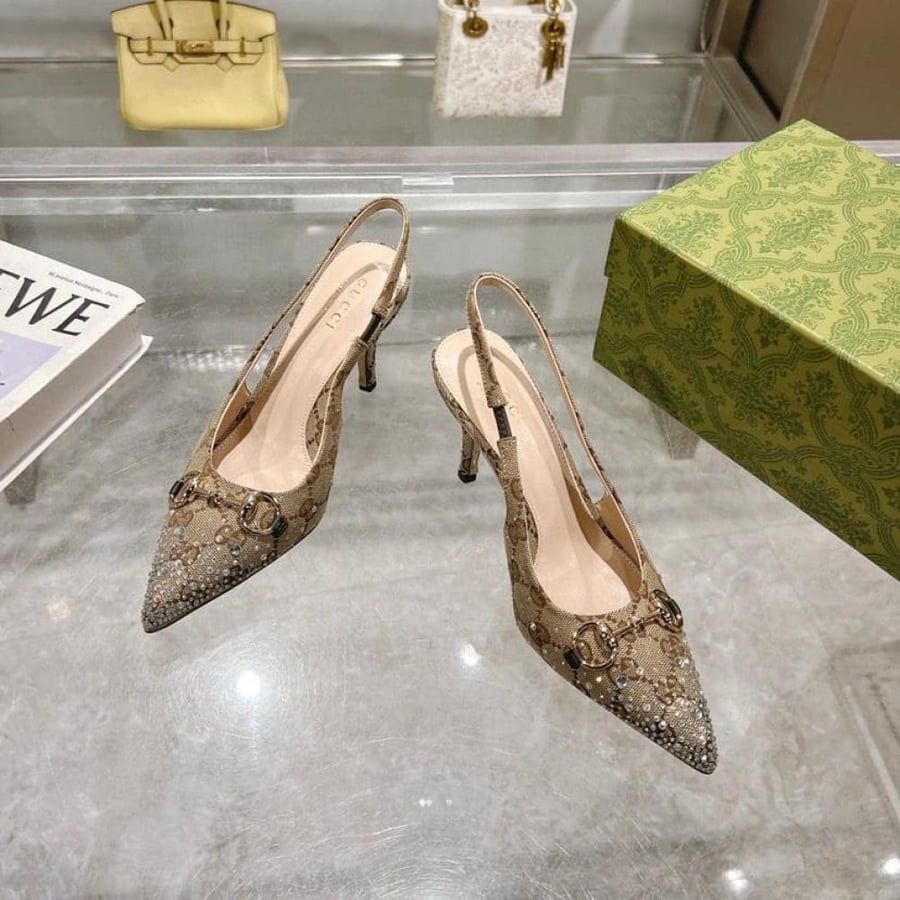 High heel 8.5 cm open at the back with elastic strap