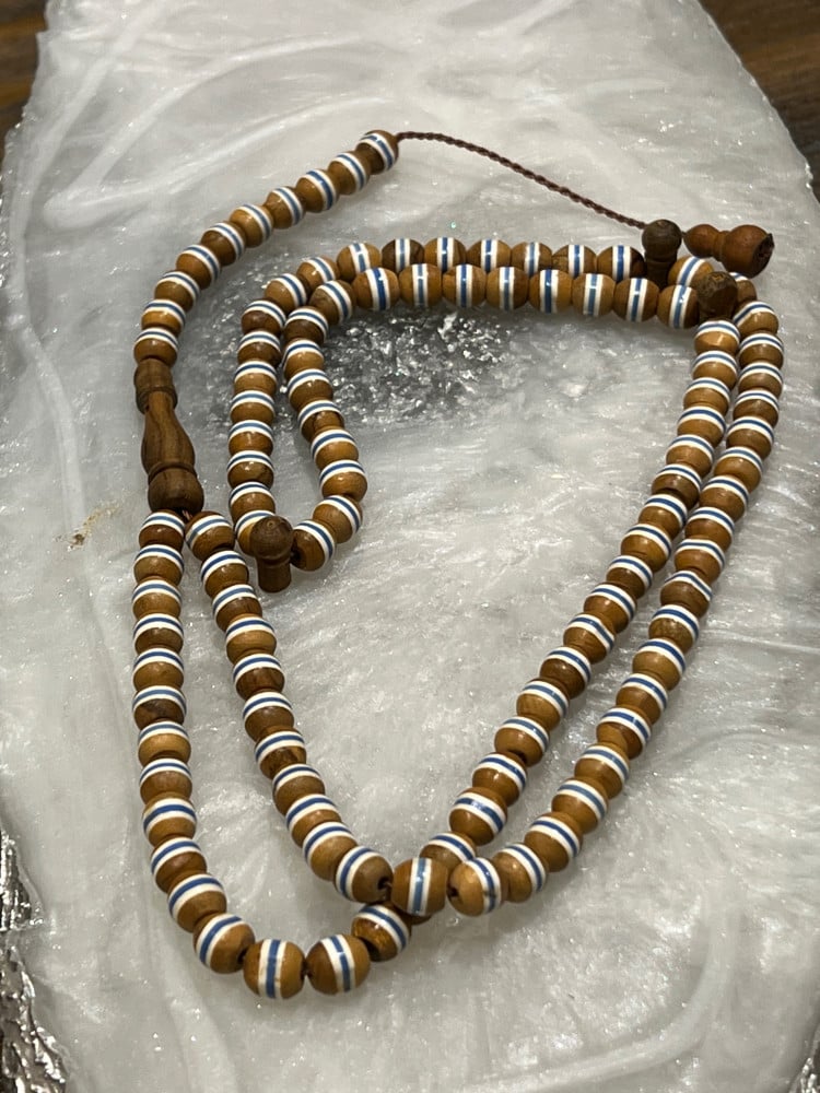 سبحة زيتون مشغولة عدد 99 وزن السبحة 23 جرام