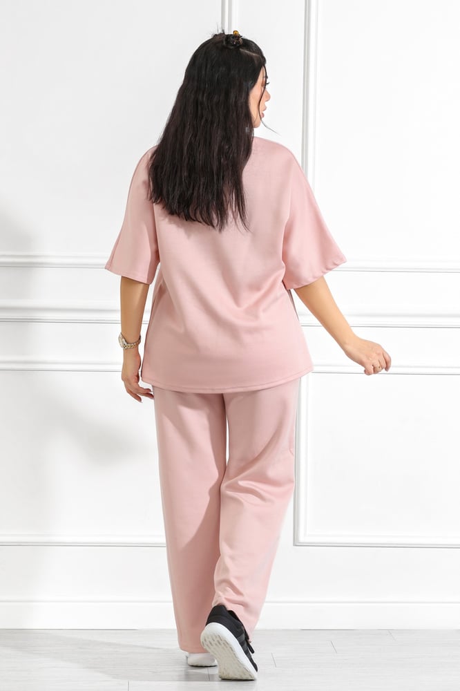 Women's casual tracksuit with mid-length sleeves, featuring a horizontal white stripe on the t-shirt and a vertical stripe on the pants.