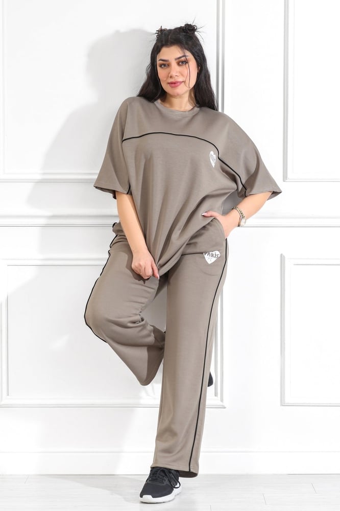 Women's casual tracksuit with mid-length sleeves, featuring a horizontal white stripe on the t-shirt and a vertical stripe on the pants.