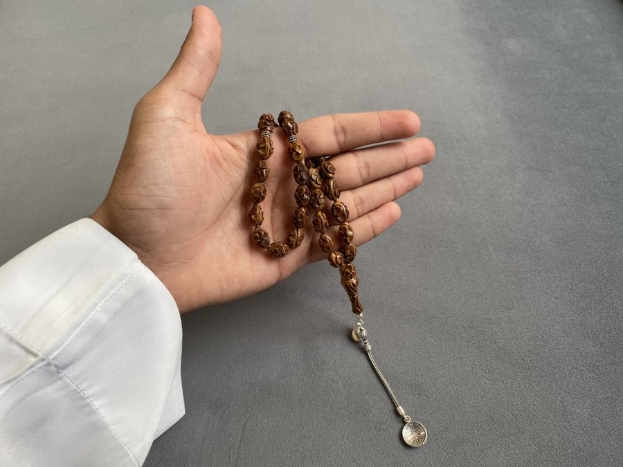 Kook rosary engraved