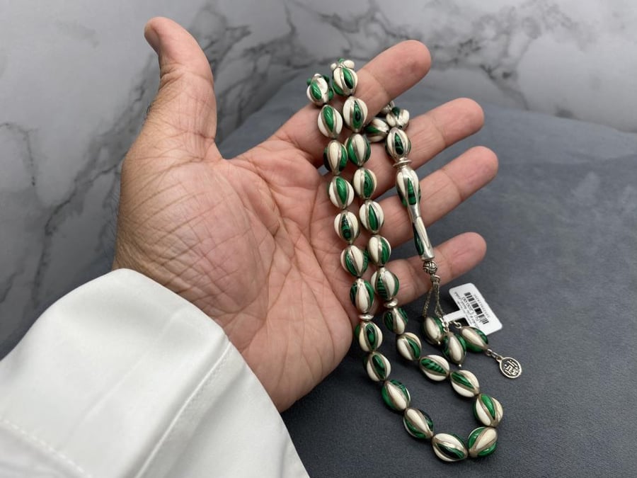 قفص فضة عاج و ملاكايت