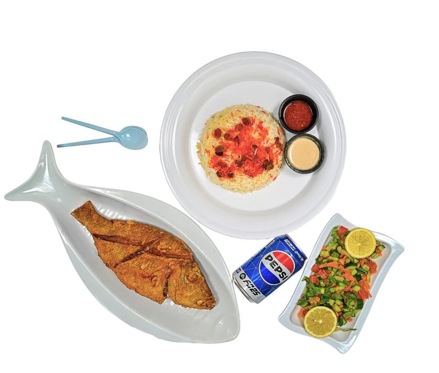 Shorouq fish meal with rice, drink, and green salad