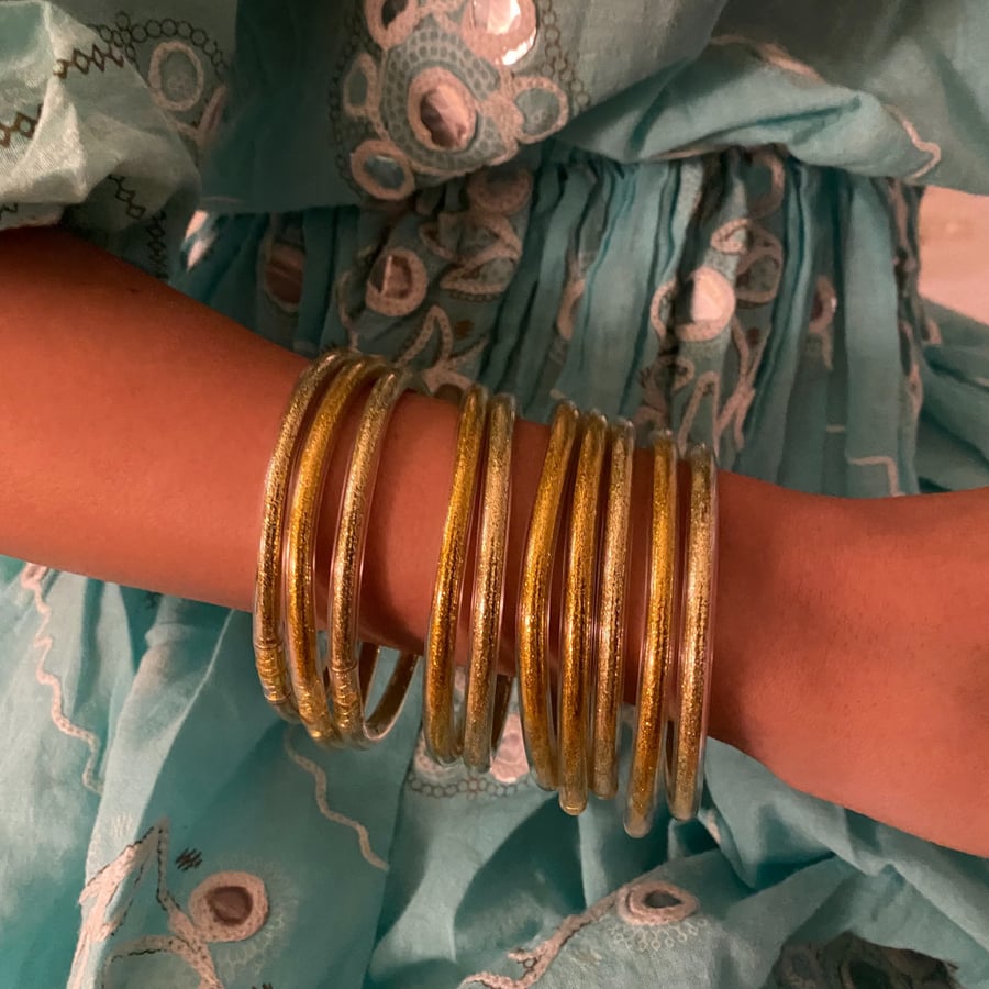 (5 حبات) plastic bangles-gold color