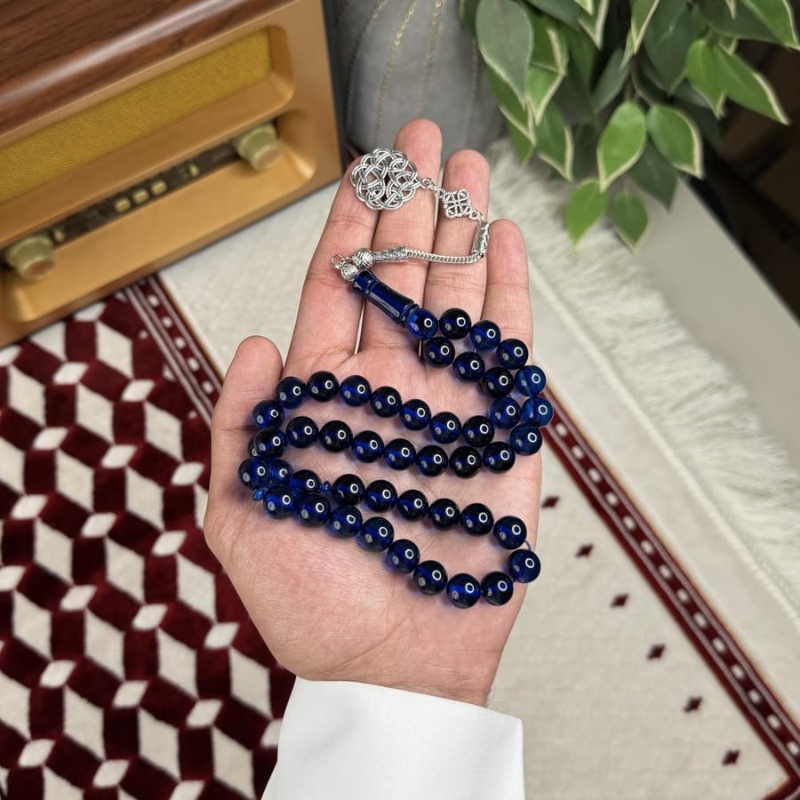 سبحة بكلايت أزرق غامق شفاف