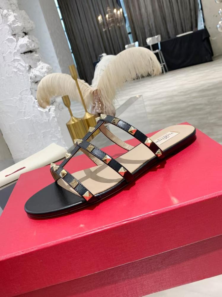 Valentino Garavani gold Rockstud leather sandals black