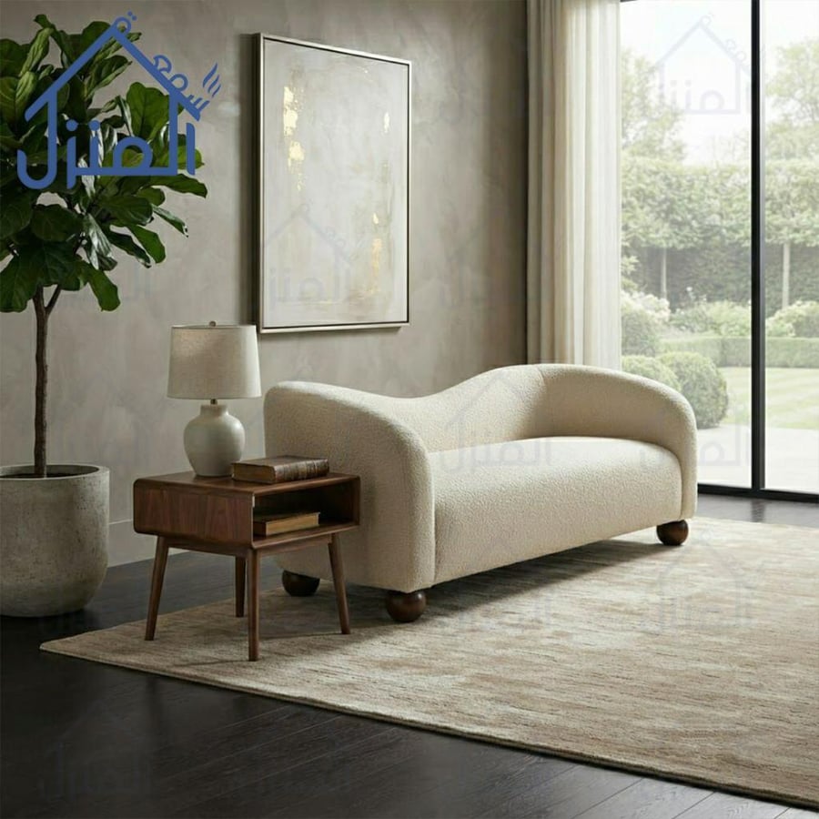 كنبة بوكليه كريمية بتصميم منحني عصري لمجالس وغرف المعيشة