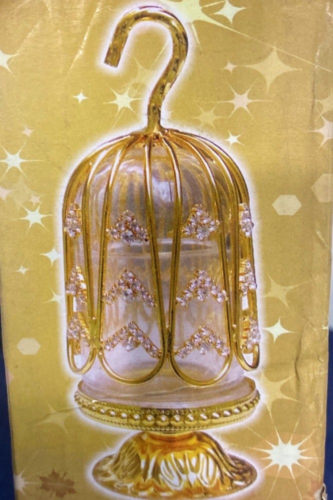 حامل اعواد اسنان ذهبي