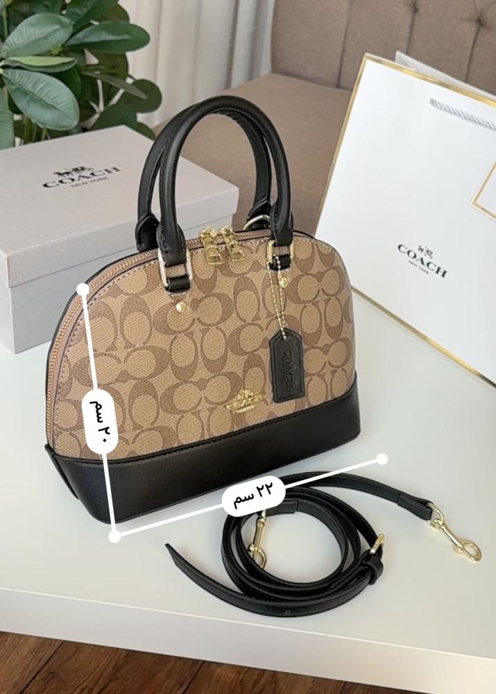شنطة كوتش هرم مع كرز