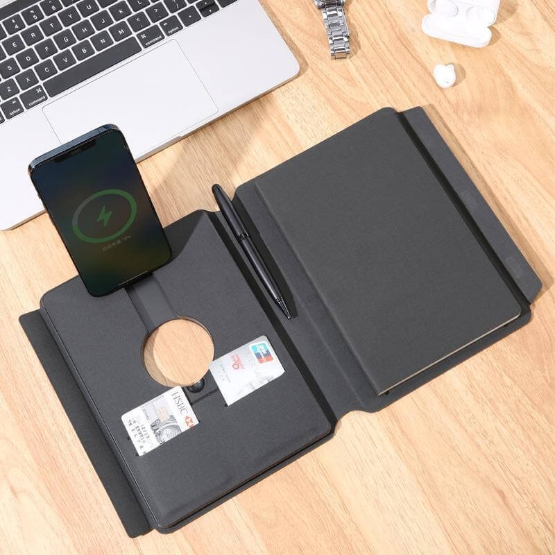 OneX Change Zero power bank in use with smartphone and laptop