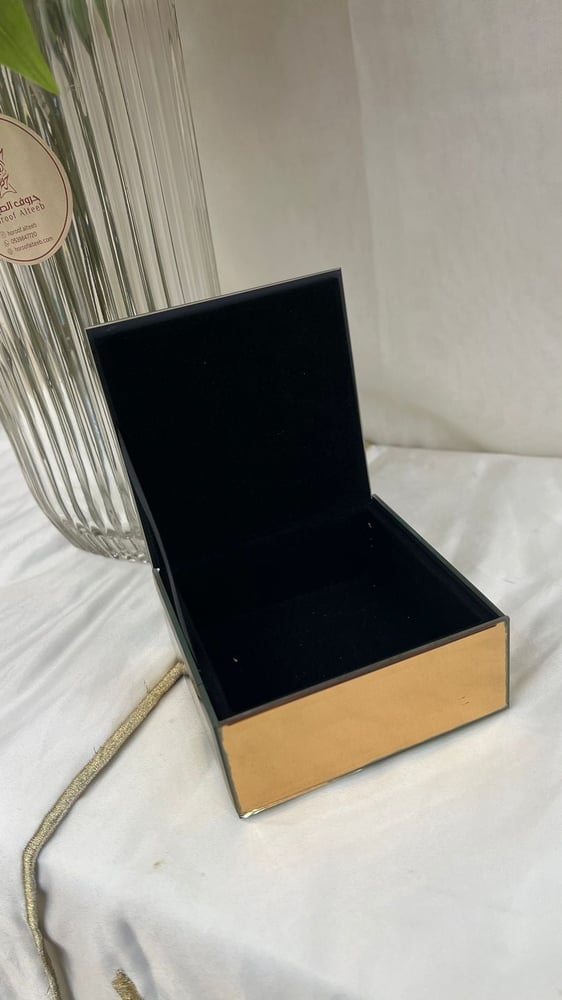 Golden and silver crystal box