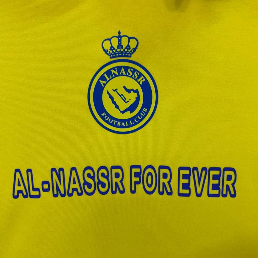 بلوفر النصر الاصفر