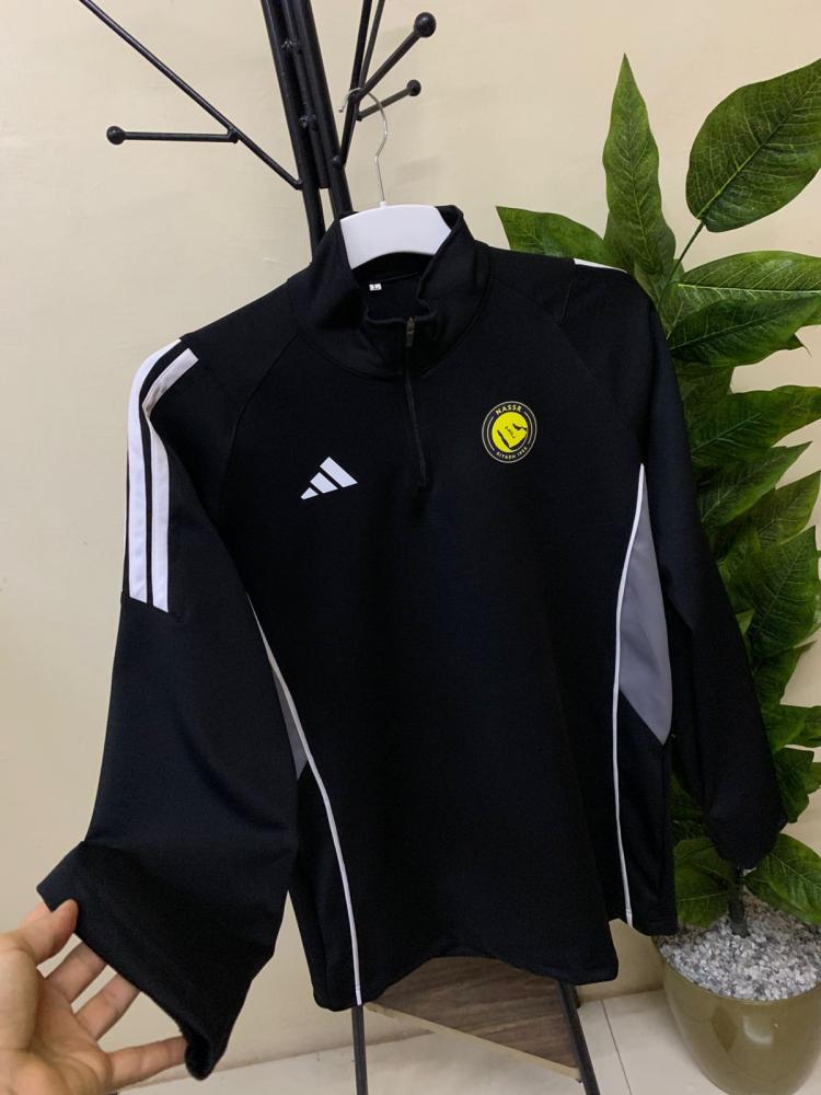 سويتر النصر الاسود 2026 كم طويل