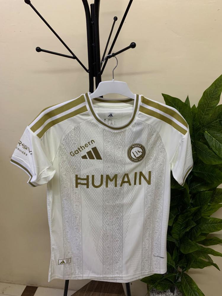 بكج النصر الاصفر 2027 ( تيشيرت وشال وتعليقة وميدالية  )