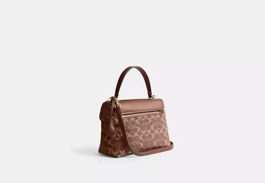 حقيبة يد نسائية Coach صغيرة جلد فاخر – تصميم أنيق بكروس بودي (عدة ألوان)