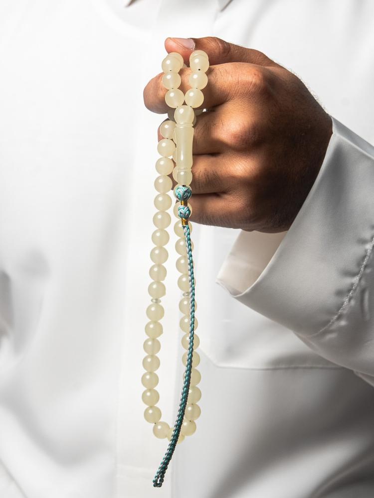 مسباح بكلايت عاجي شفاف