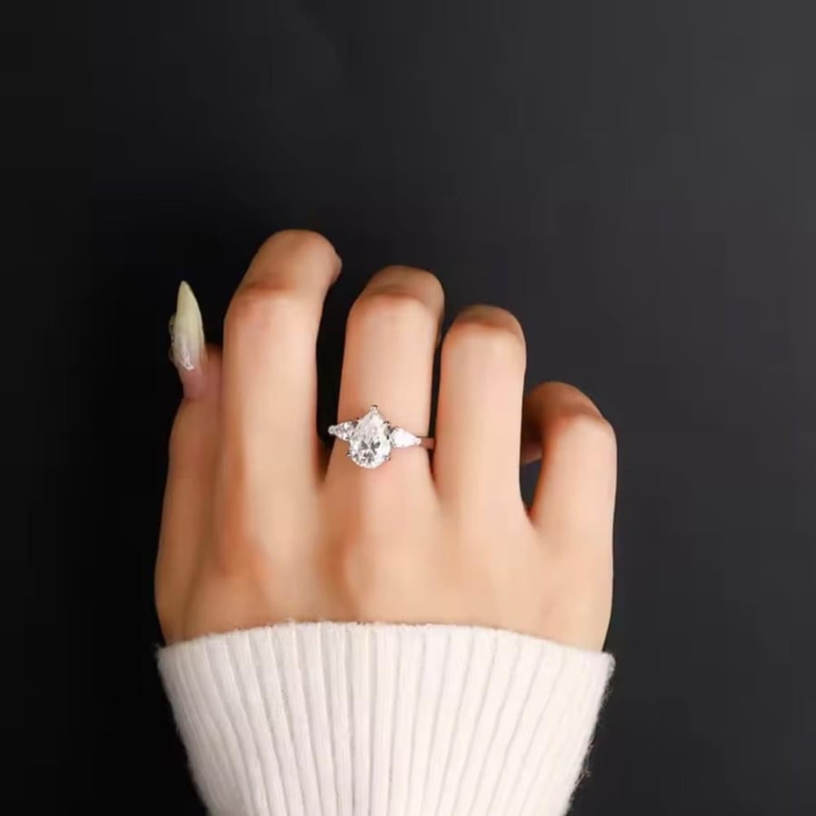 Pear shaped moissanite silver ring