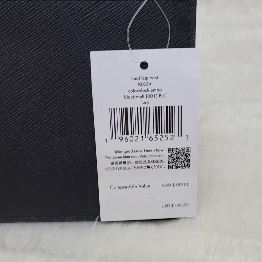 محفظة كيت سبيد Kate Spade Lucy Izip wrislet